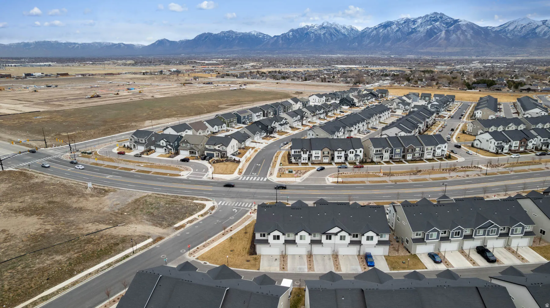 Newer residential development featuring multi-level townhomes and single-family residences