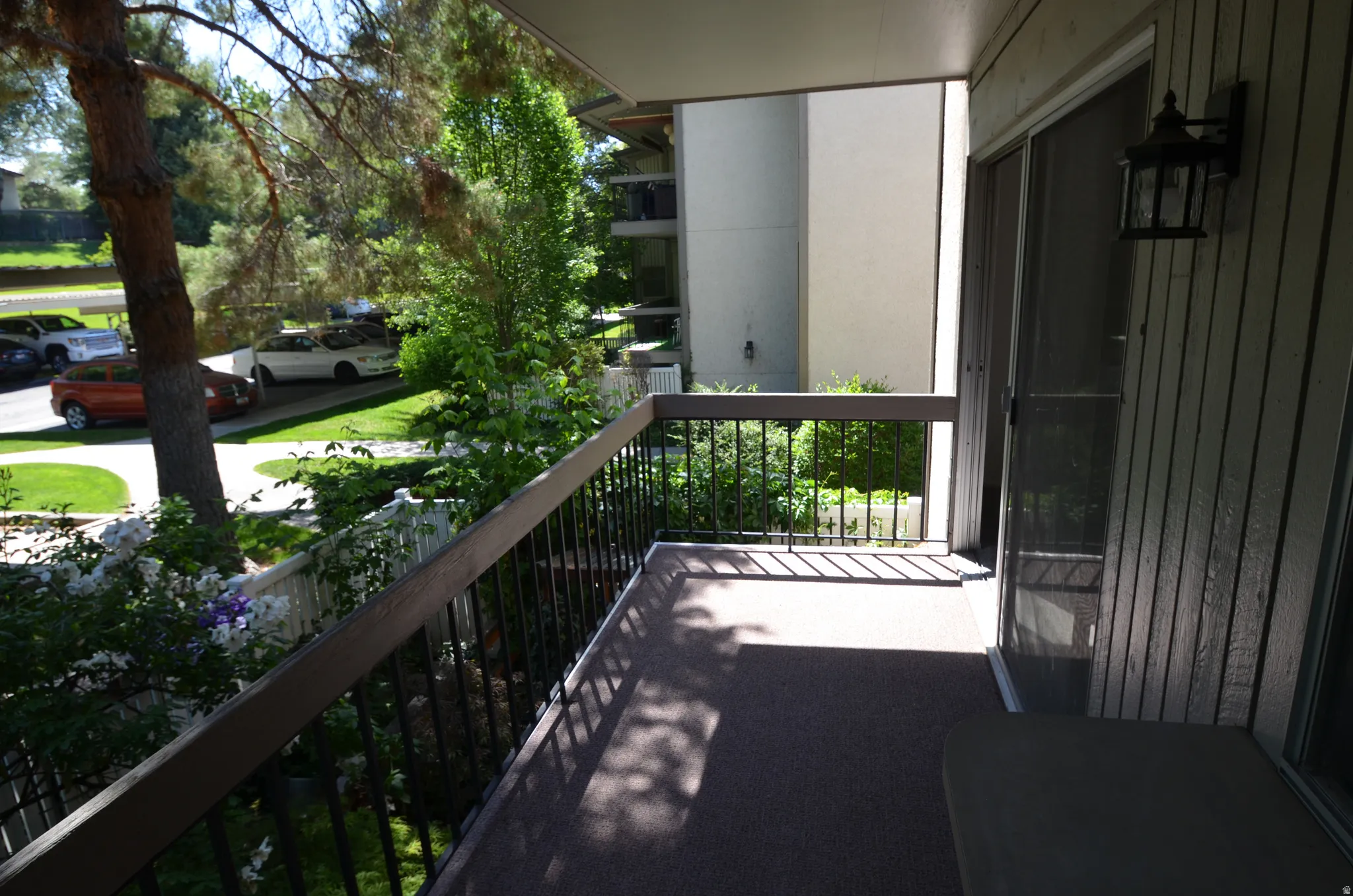 Deck off the front room with storage area