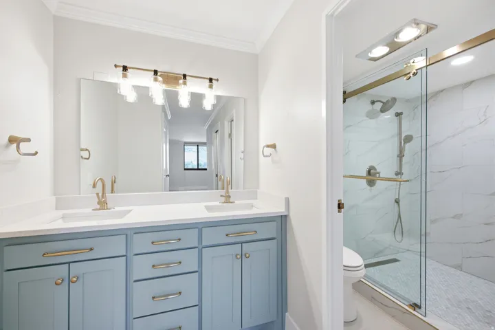 Updated bathroom with high-end finishes and a walk-in shower.