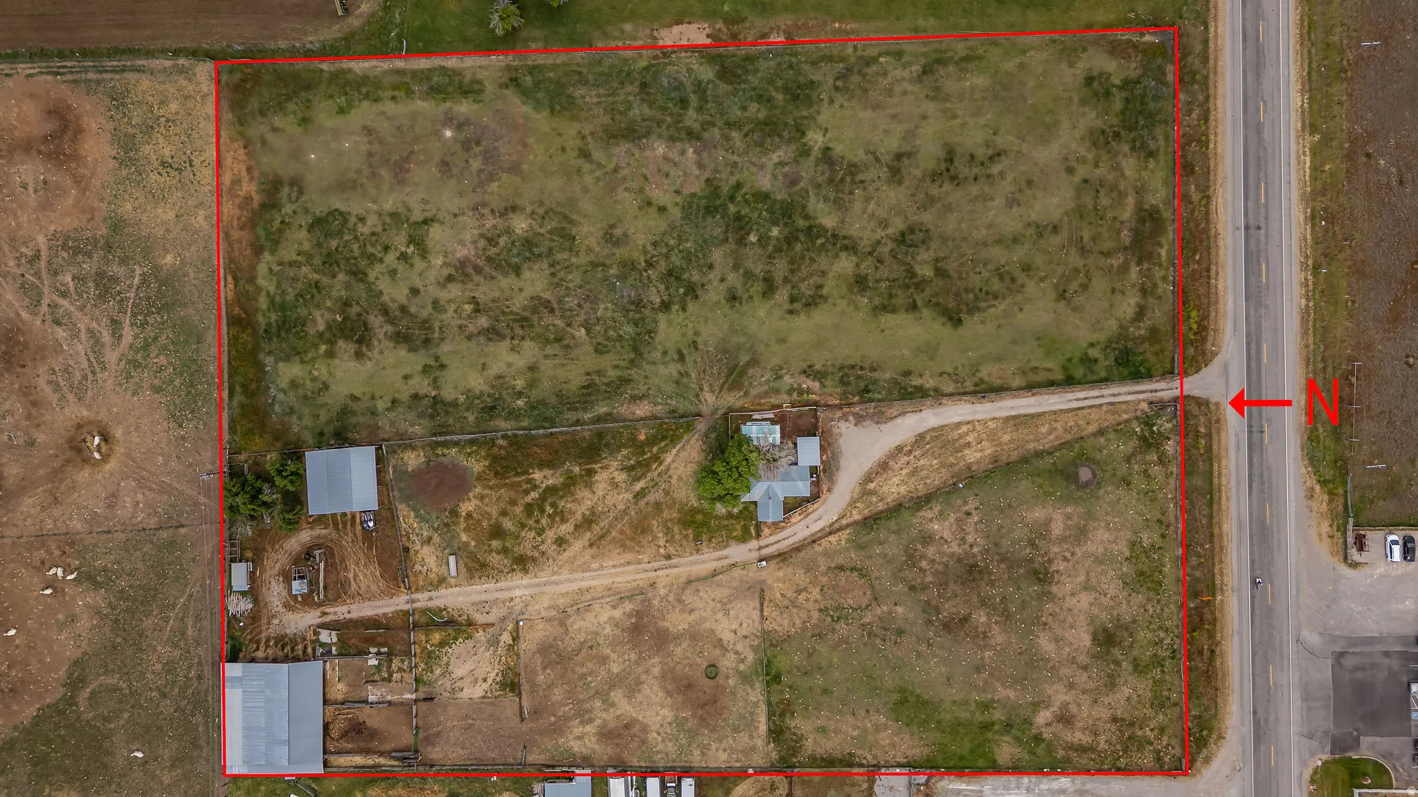 Aerial Property Delineation. Illustrating the property boundary and existing structures