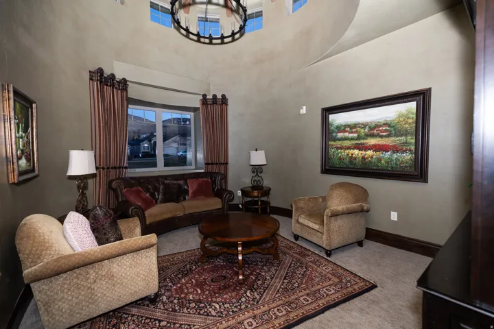 Vaulted ceilings with architectural detailing and upper windows