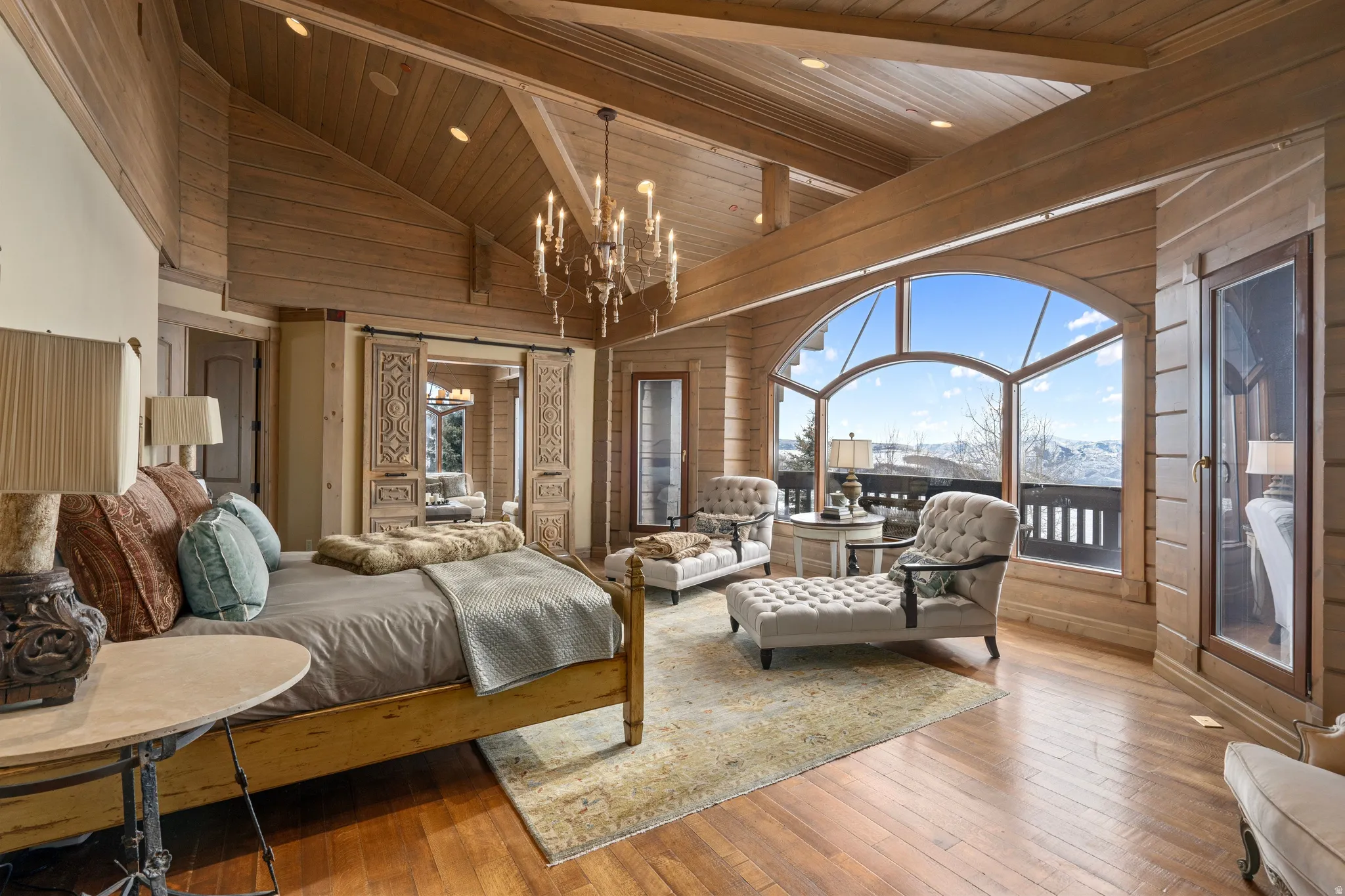 Vaulted wood-paneled ceiling with exposed beams