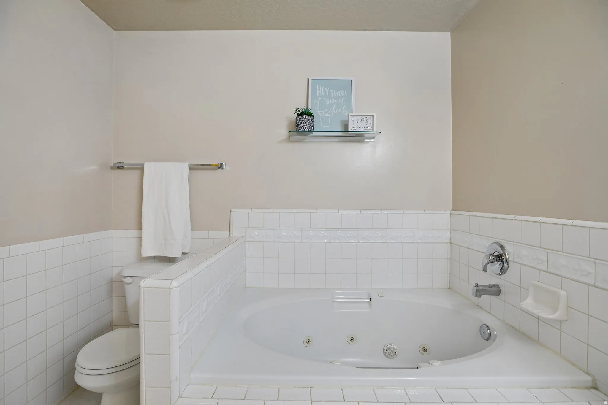 Soaking tub with integrated jets and chrome fixtures