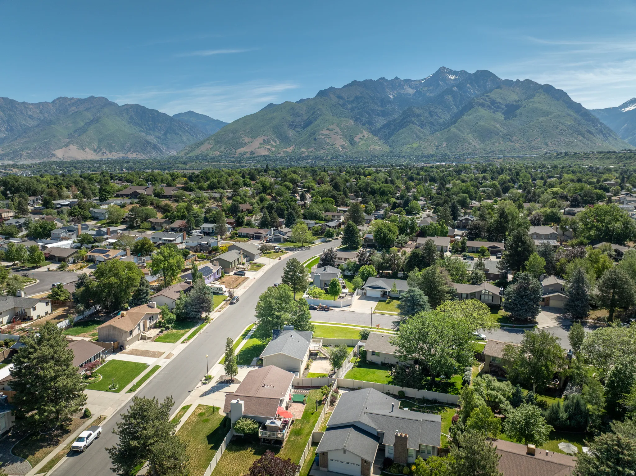 Expansive neighborhood featuring mature trees and established residential properties