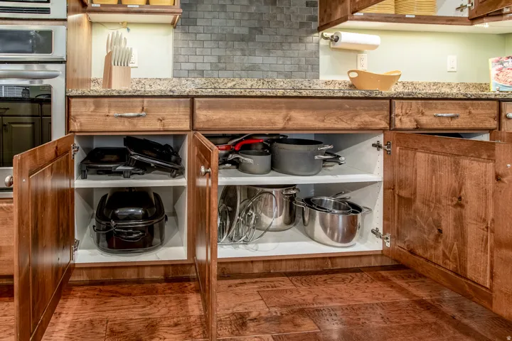 Wood-finish flooring complementing rich wooden cabinetry