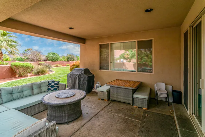 Covered patio with concrete flooring, recessed lighting, and a sliding glass door entry