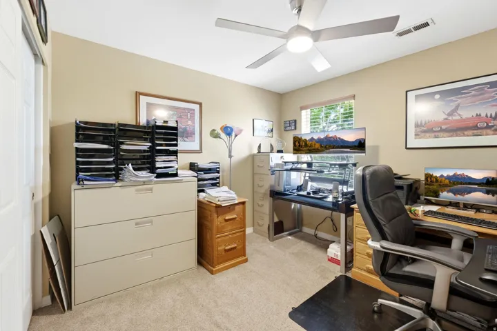 Versatile room featuring neutral-toned walls and carpet flooring