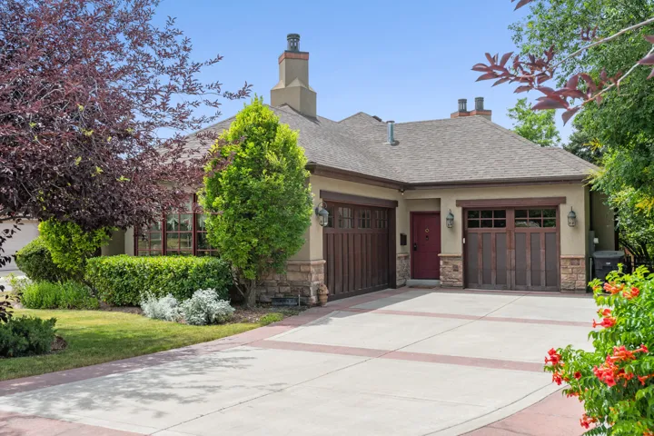 Close-up of 3-Car Garage and Side Entrance