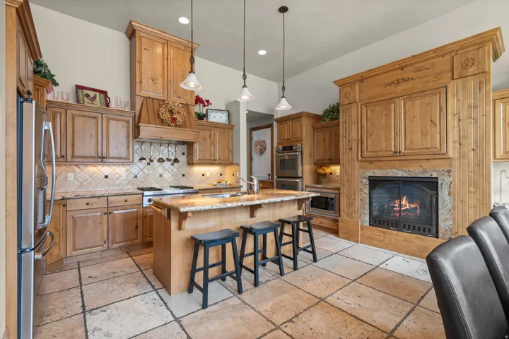 Kitchen – White Door Leads to 2-Car Garage