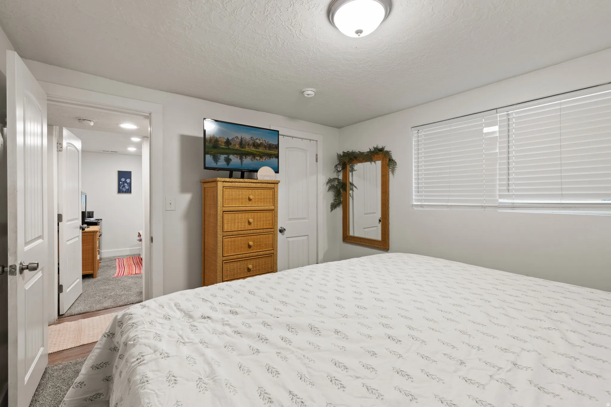 Bedroom featuring carpeted flooring and white walls