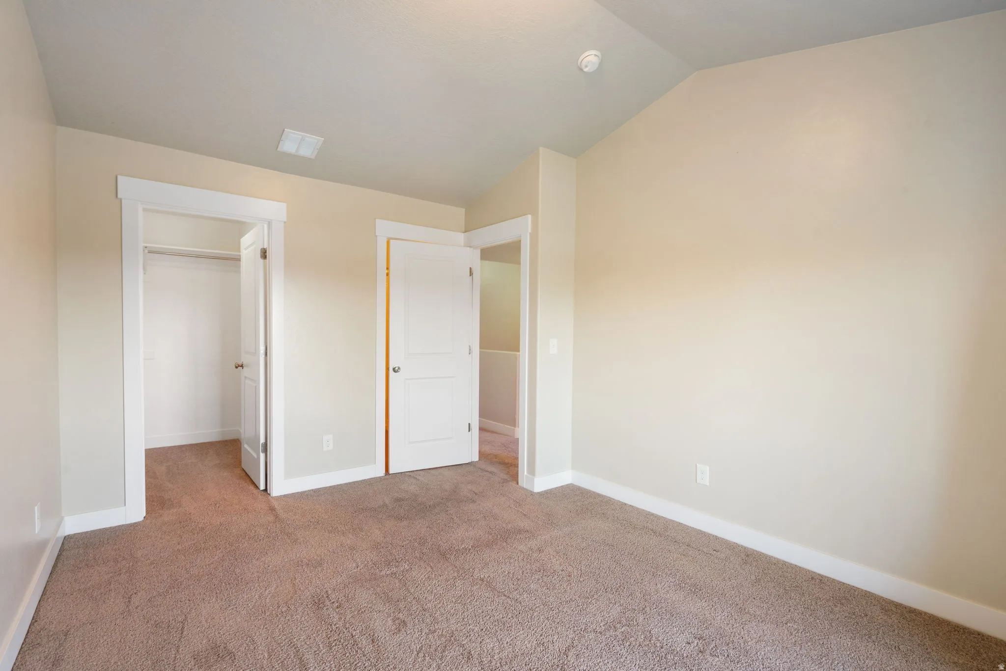 Primary Bedroom with walk-in closet