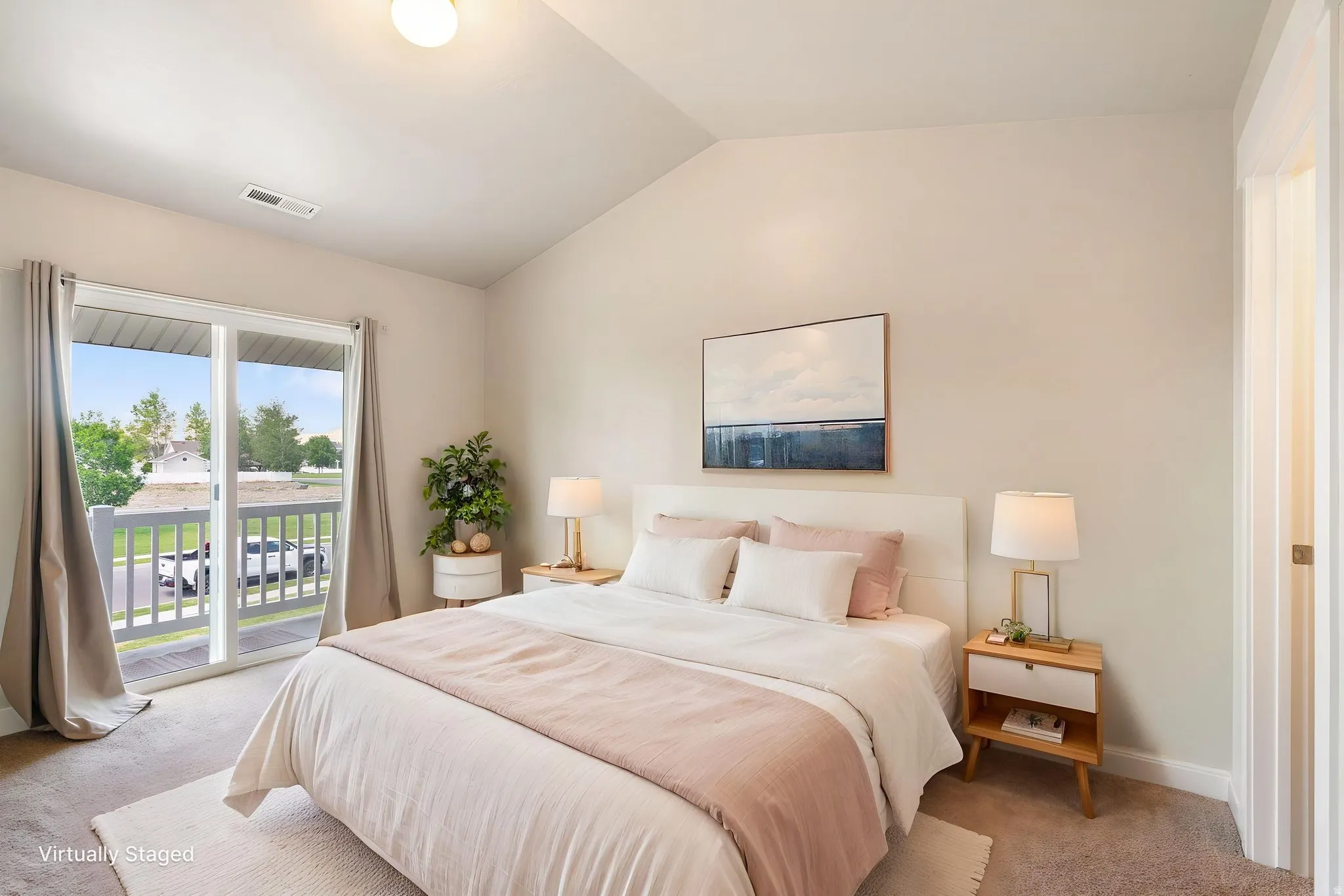 Virtually staged, Primary Bedroom, with walk-in closet and balcony.