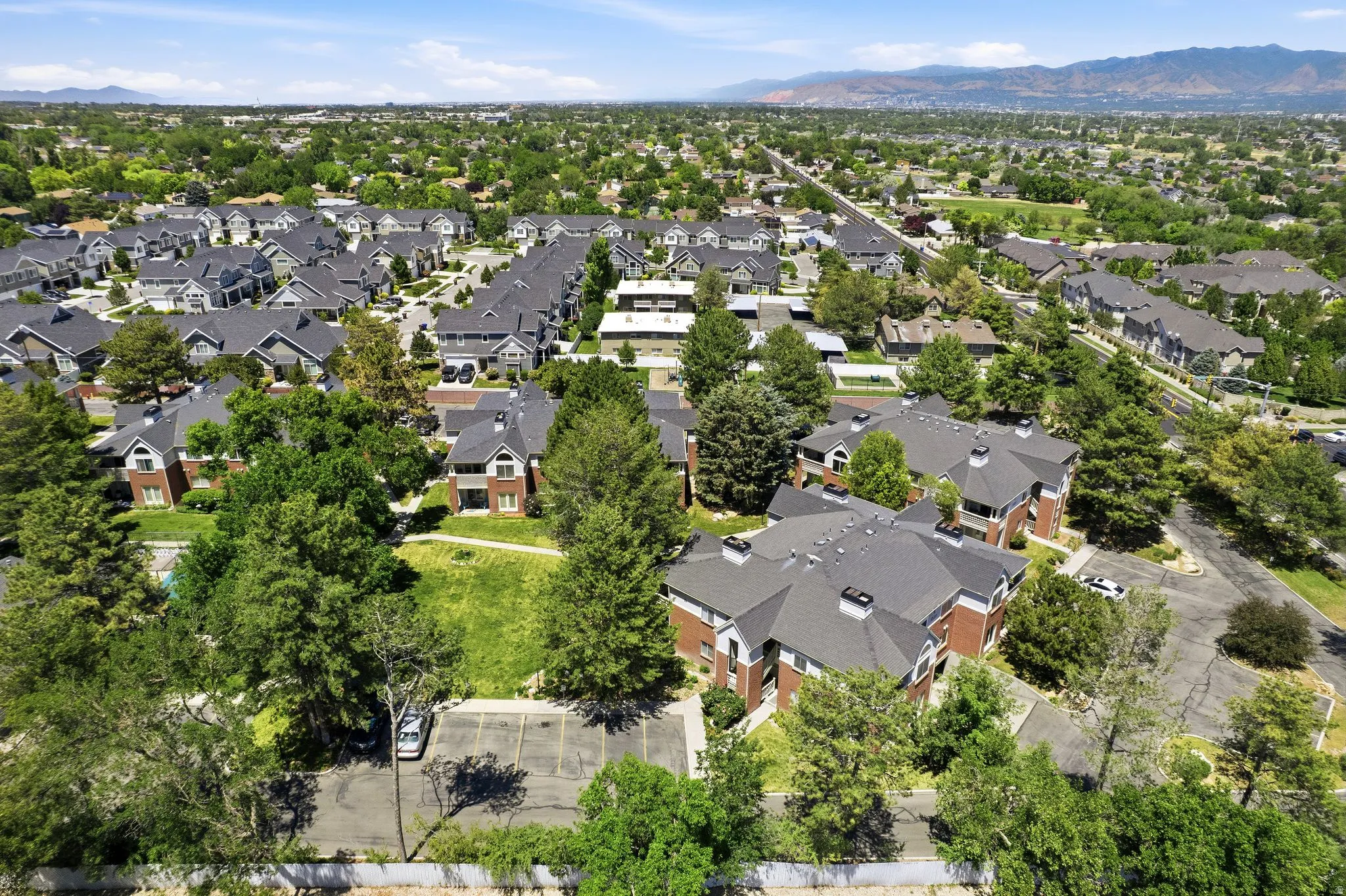 Aerial depiction of a residential neighborhood with varied housing styles