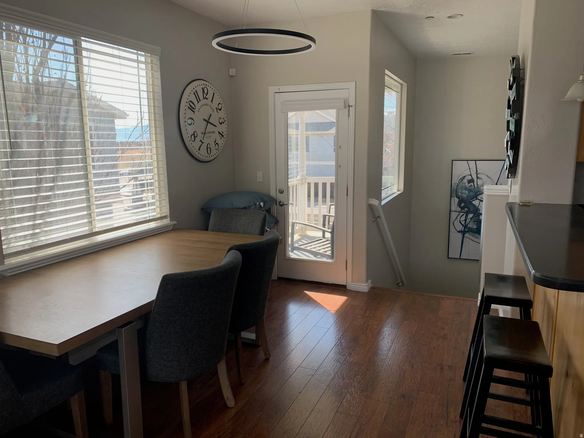 Hardwood-finish flooring throughout the dining area