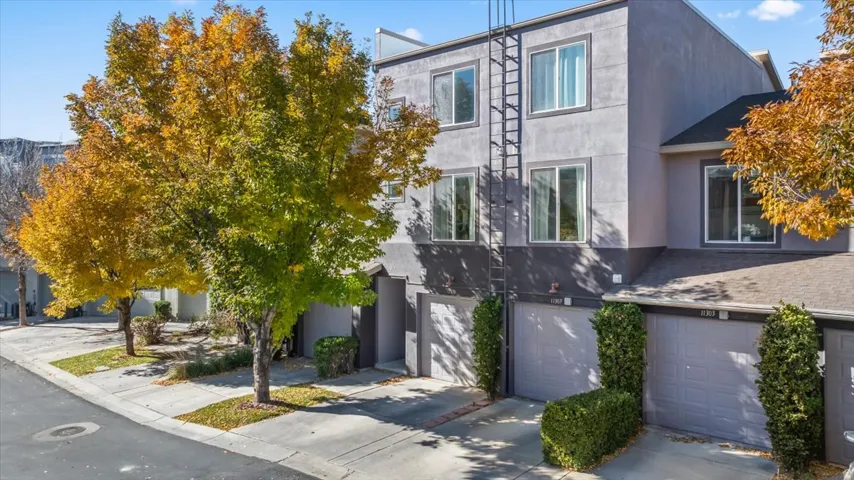 Multi-level exterior with a muted gray facade