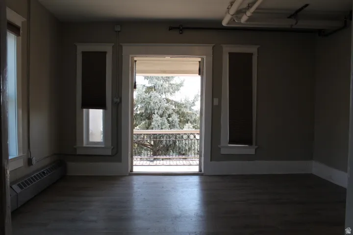 Light wood-finish flooring with neutral wall tones
