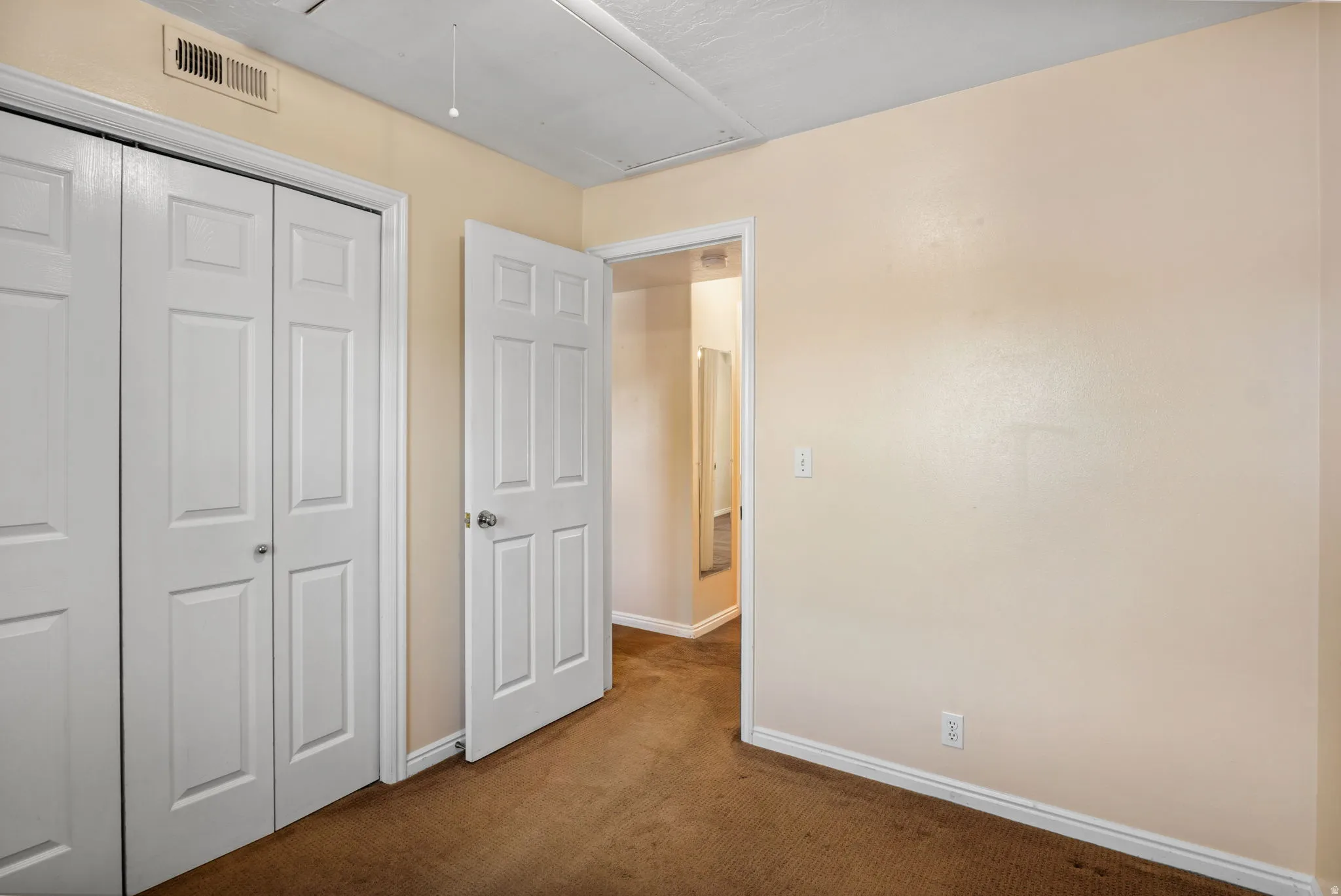 Neutral-toned wall finishes with white trim