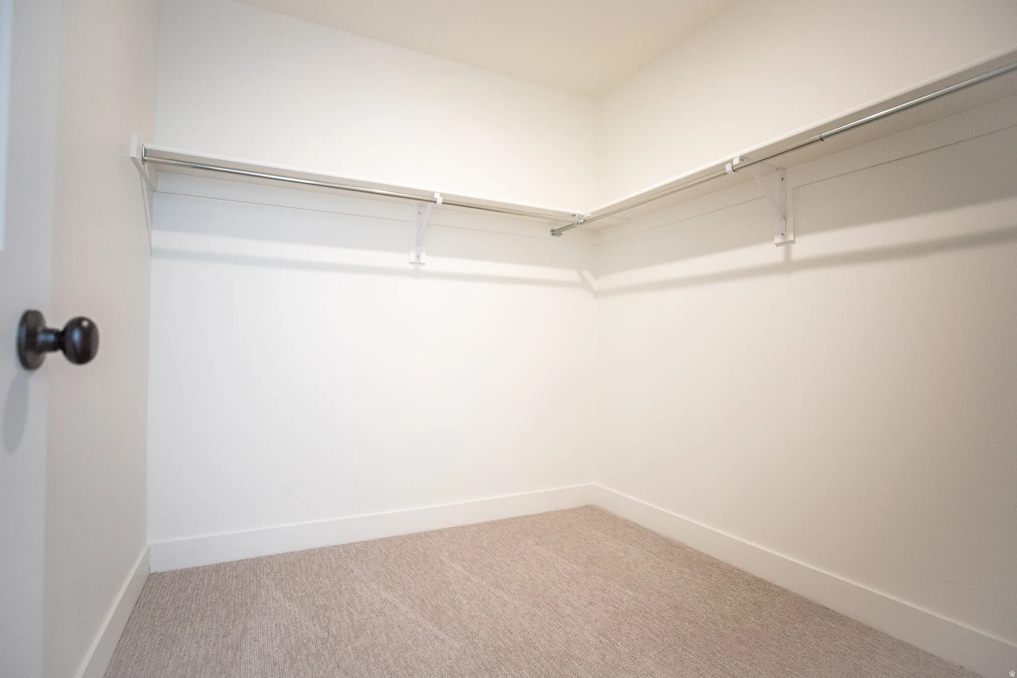 Large walk-in closet as part of primary suite.