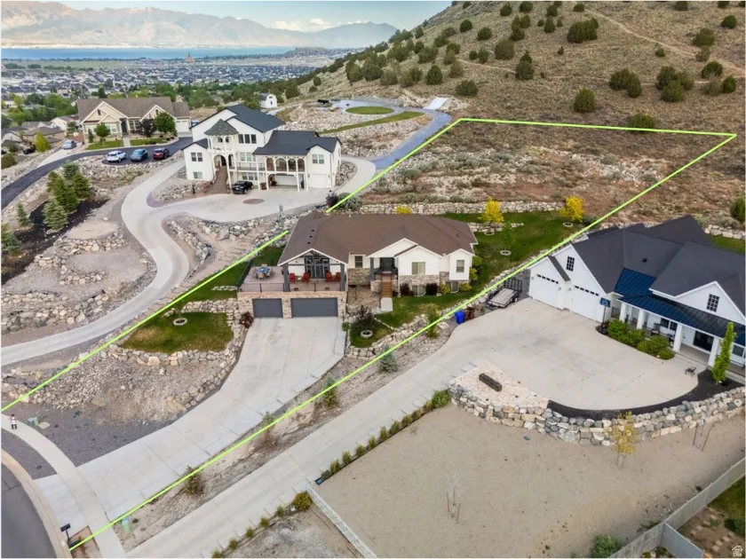 Expansive undeveloped land parcel featuring a gentle slope and natural desert landscaping