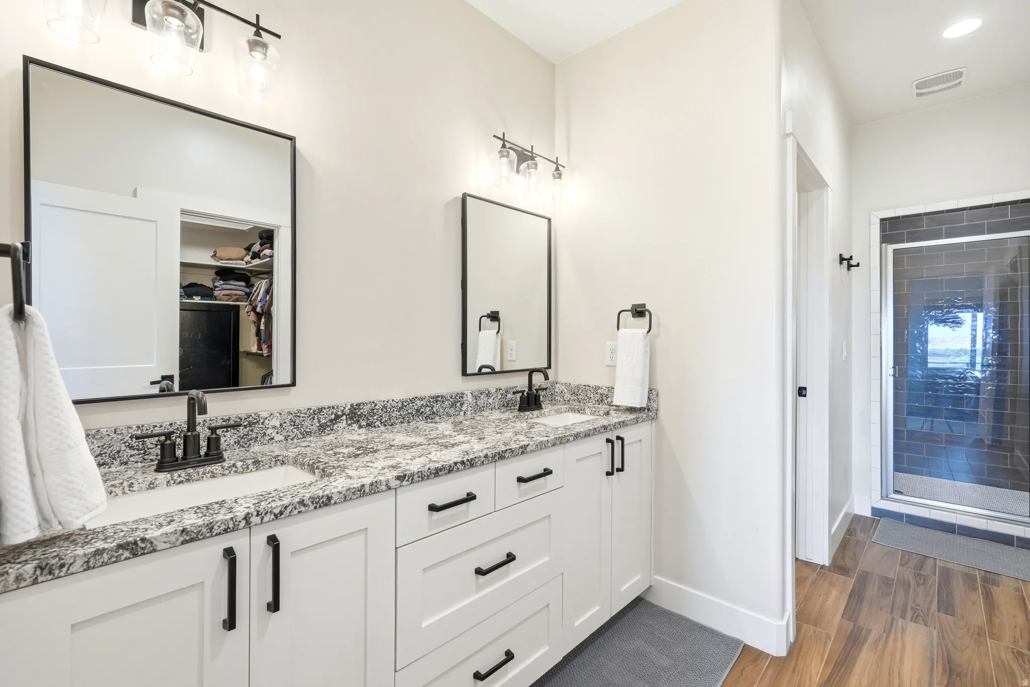 MASTER BATHROOM WITH ADULT DUAL VANITY!