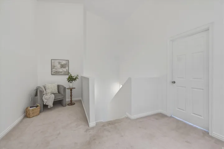 Light-toned carpeting throughout