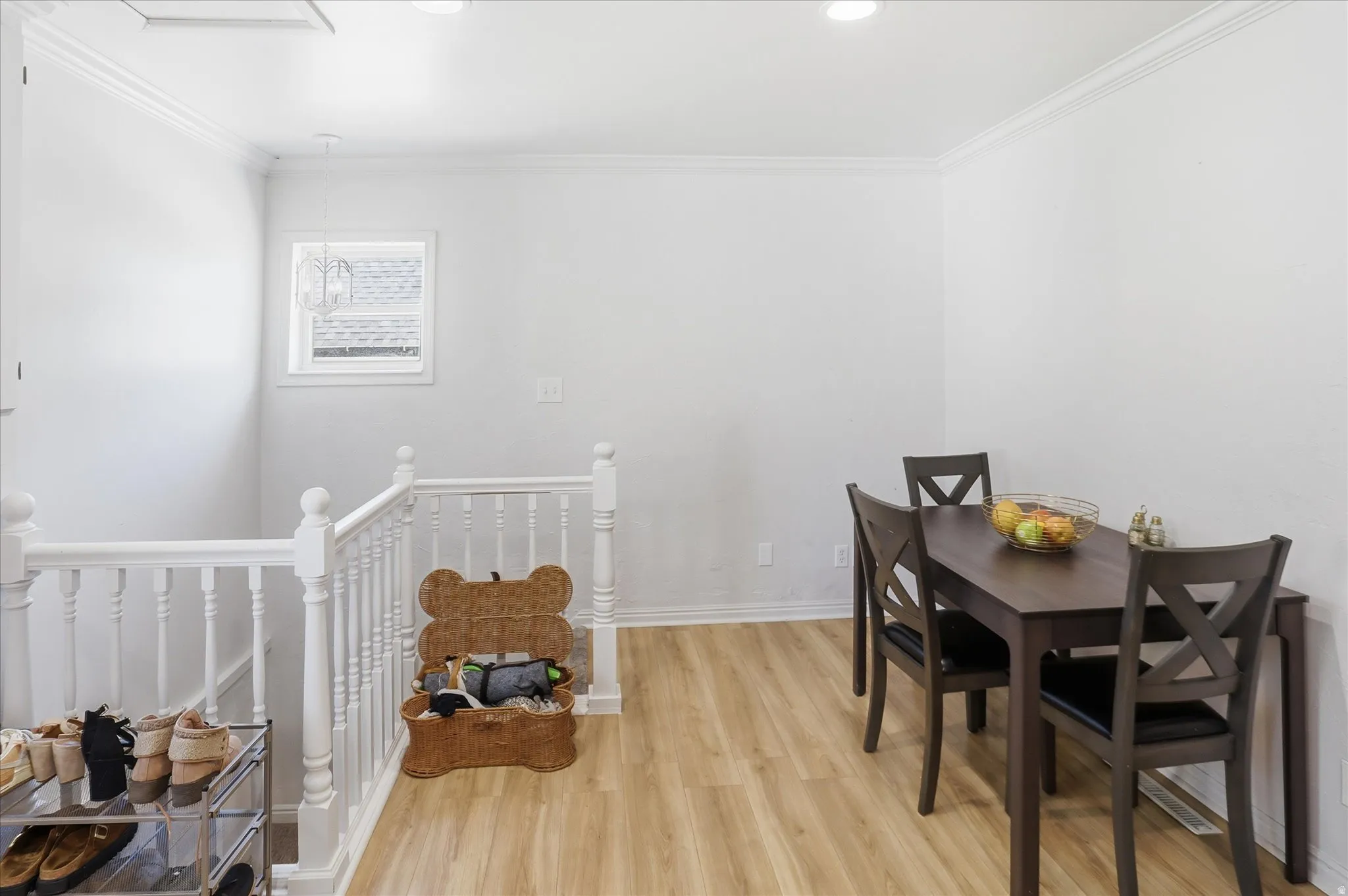 Bright interior space featuring light wood-finish flooring