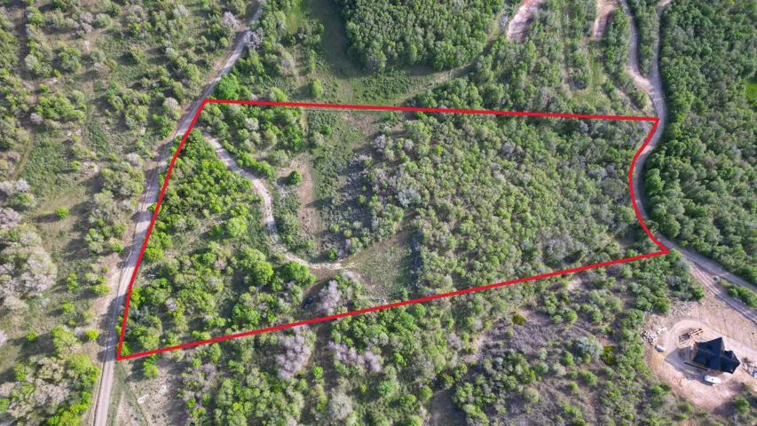 Left side of picture is the east side of the lot. Boundary lines are estimates only