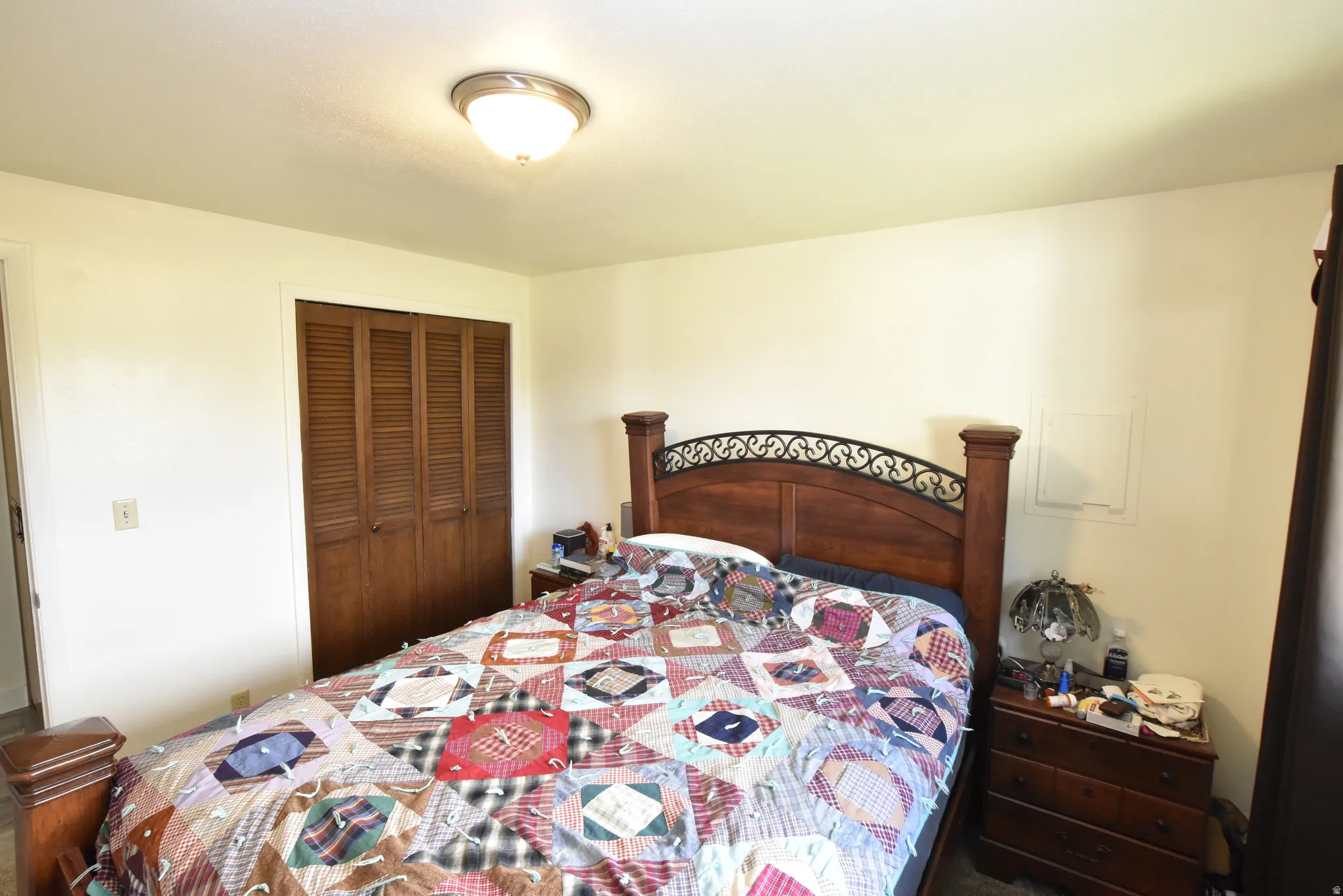 Interior room featuring light-toned walls and a flush-mount ceiling light fixture