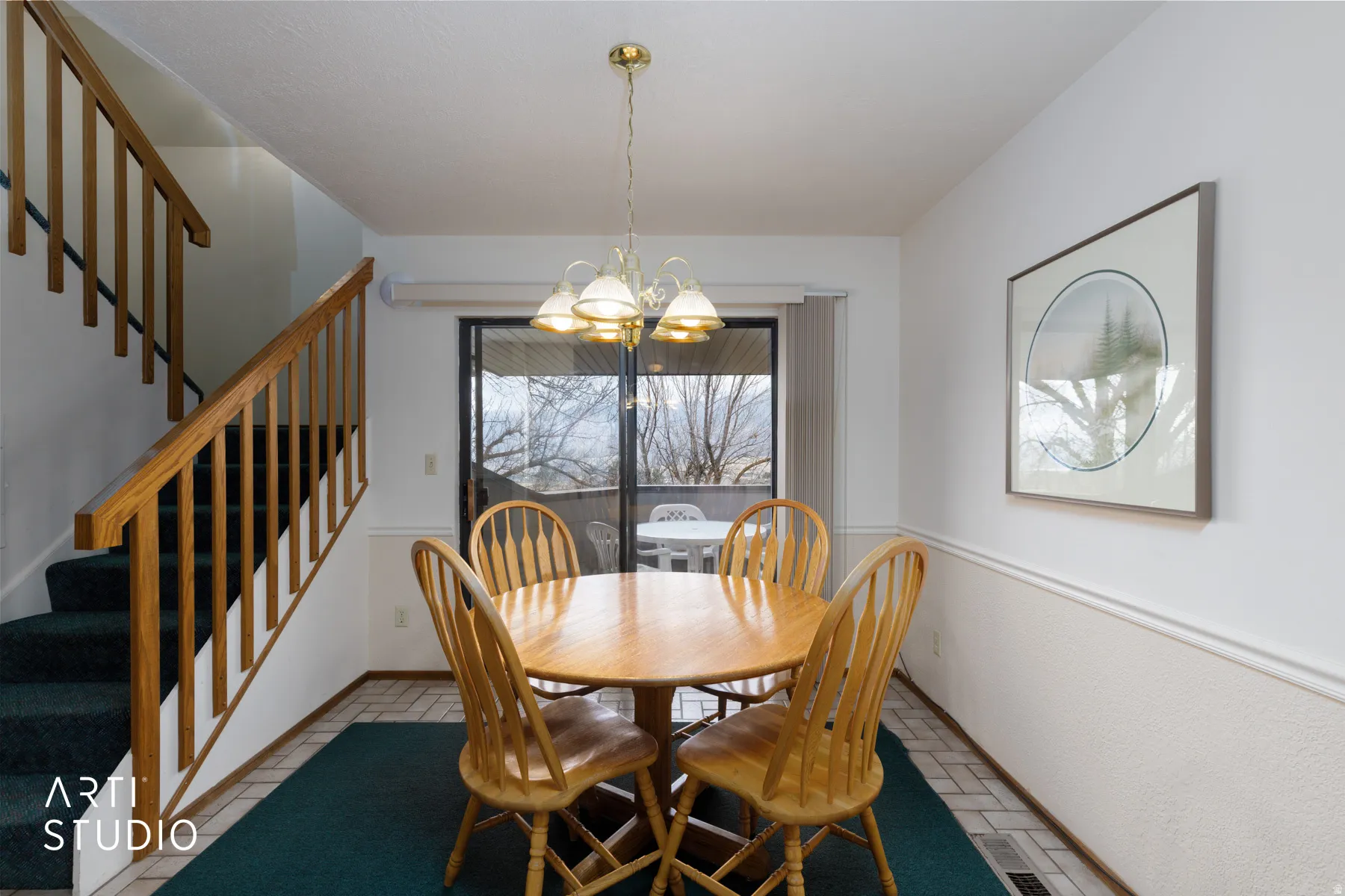 Dining area with a sliding glass door for outdoor access