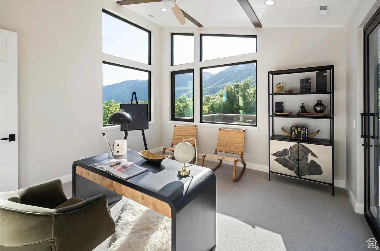 Room featuring multiple large windows, recessed lighting, a ceiling fan, and light gray carpeting