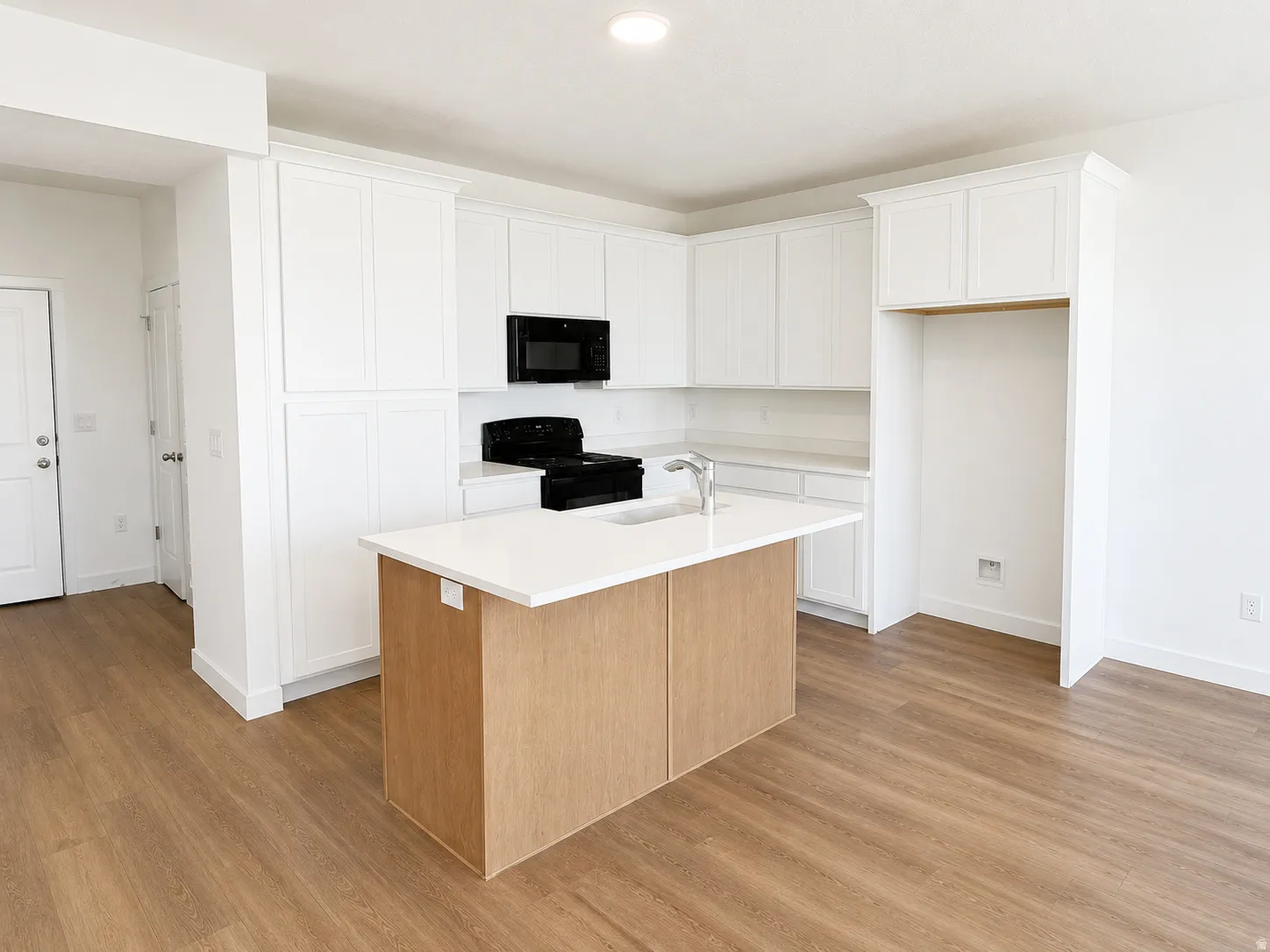 Quartz countertops with large white farmhouse sink