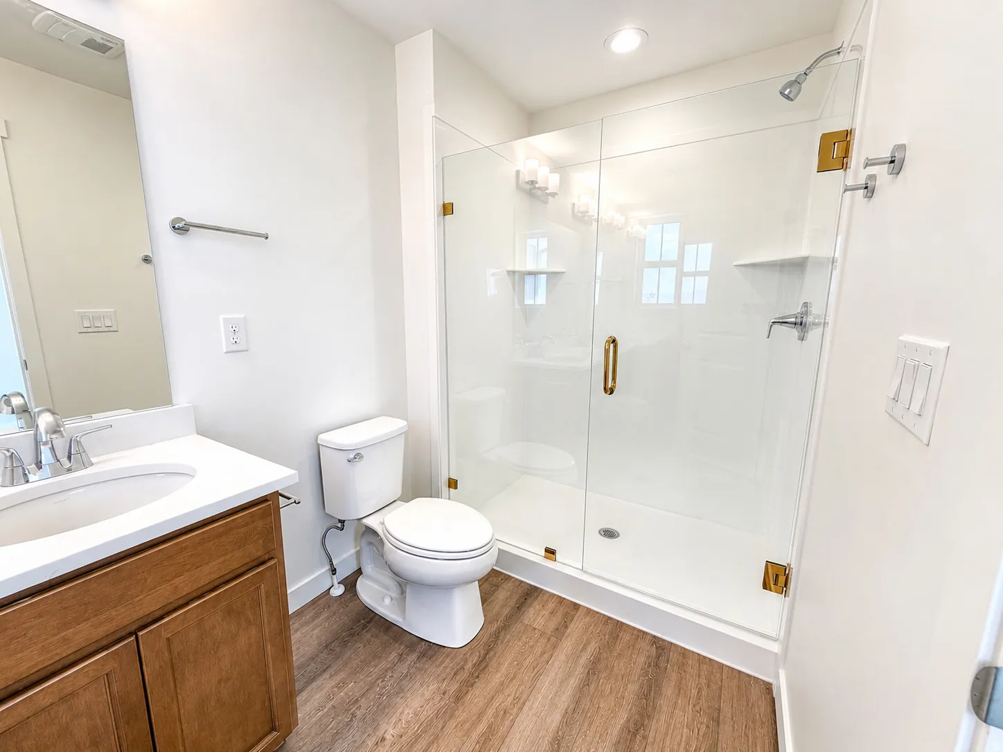 Primary Bath with Large walk in shower and double sink vanity with quartz countertops