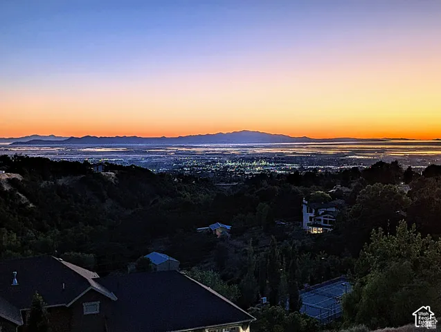 Expansive mountain and city scenery from a high vantage point
