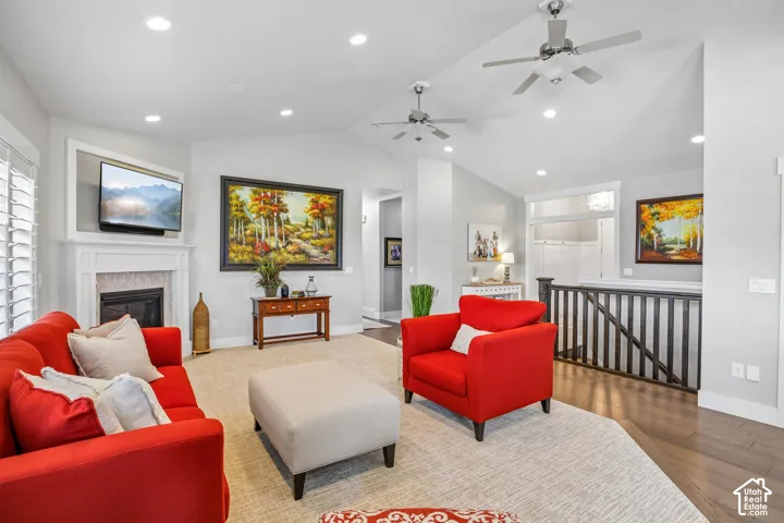 Vaulted ceilings with recessed lighting and ceiling fans