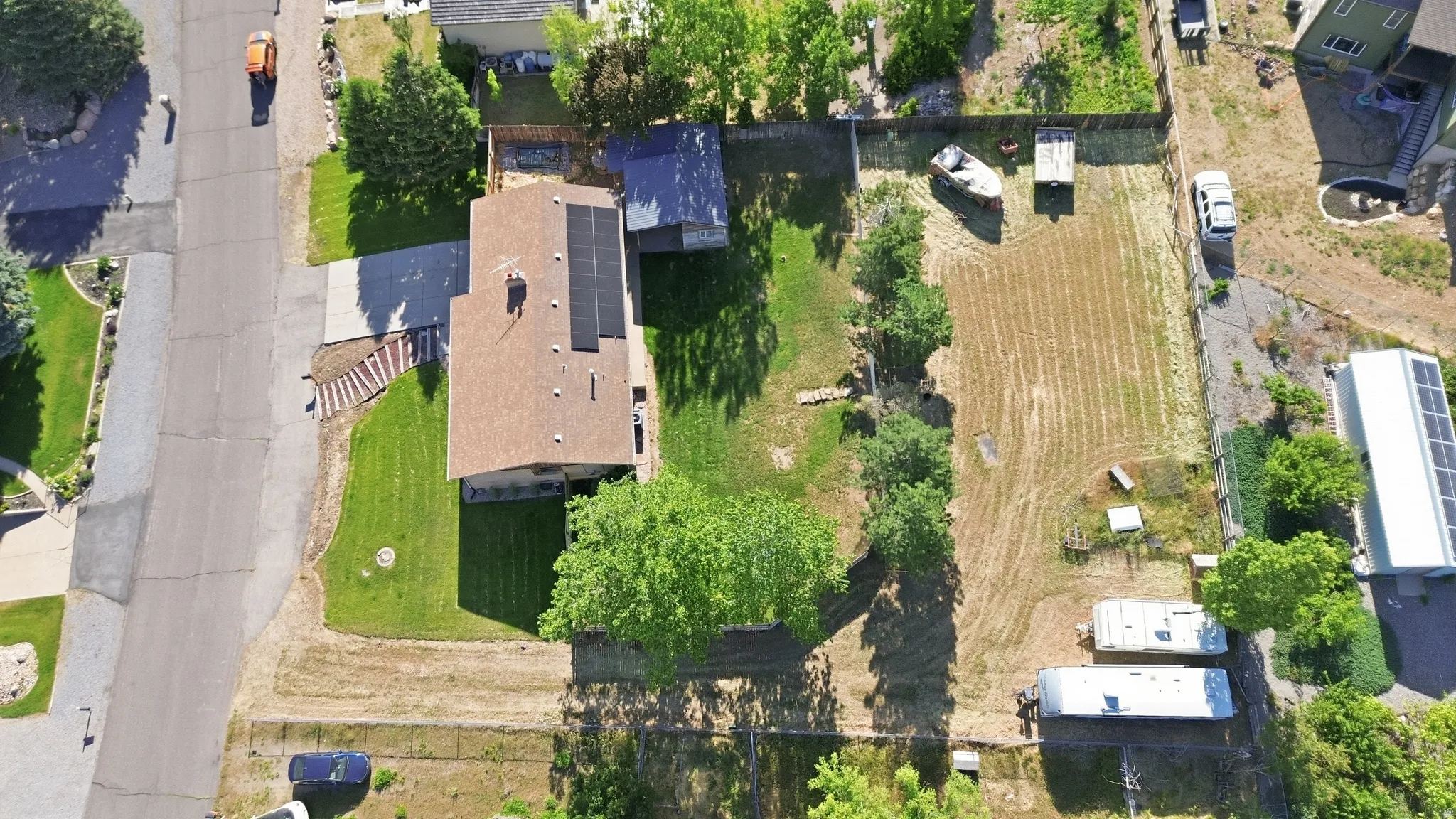 Over half acre with pasture & RV parking!