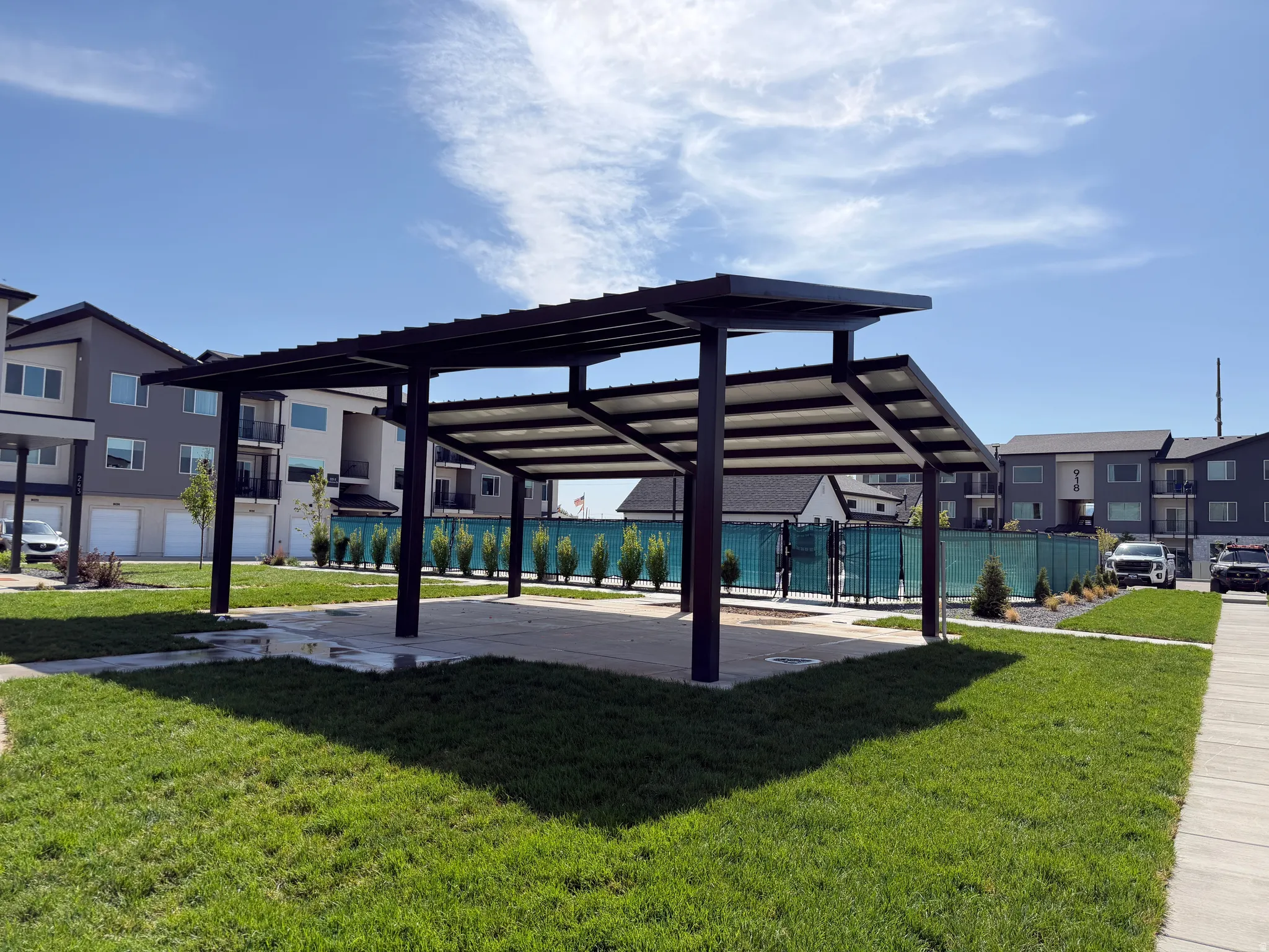 Outdoor covered patio structure with a concrete pad