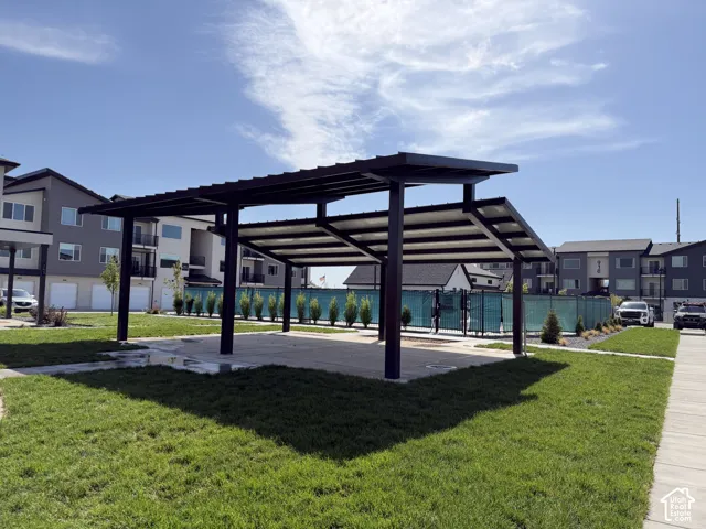 Outdoor covered patio structure with a concrete pad