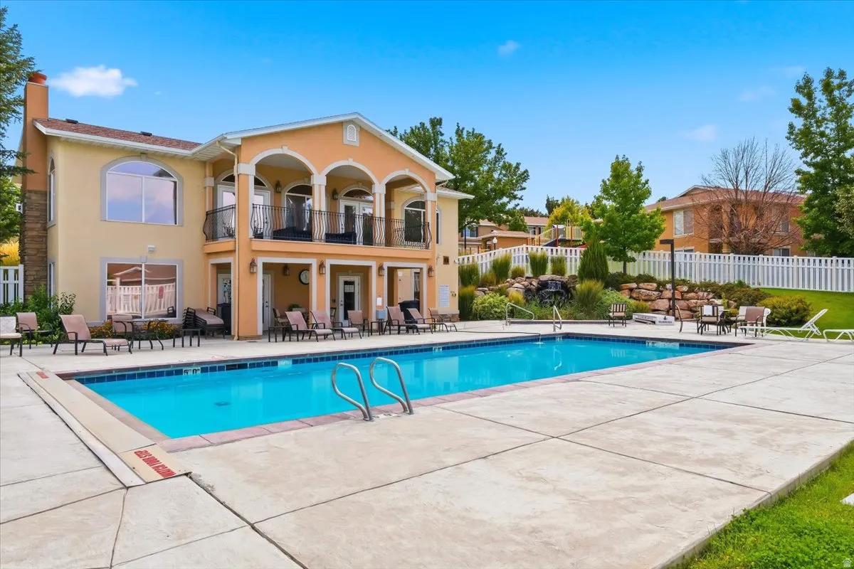 Outdoor swimming pool with concrete decking
