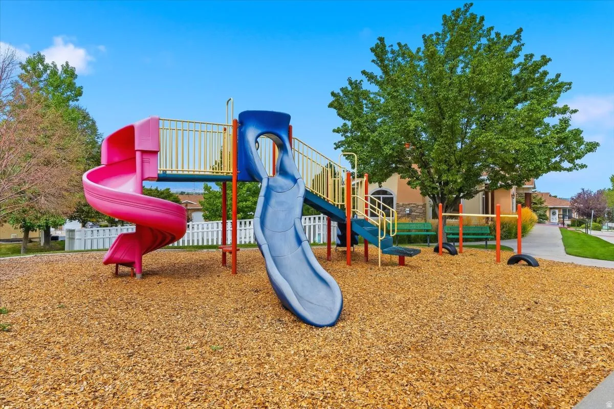 Community playground featuring colorful slides and play structures