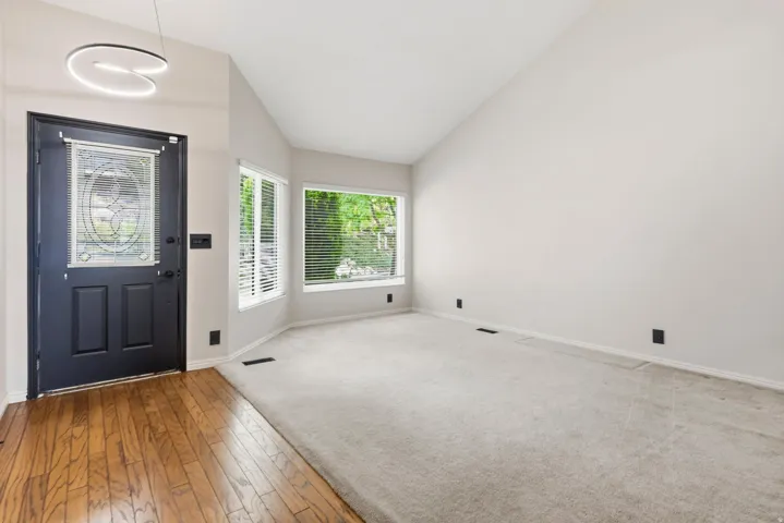Vaulted ceilings with a contemporary pendant light fixture