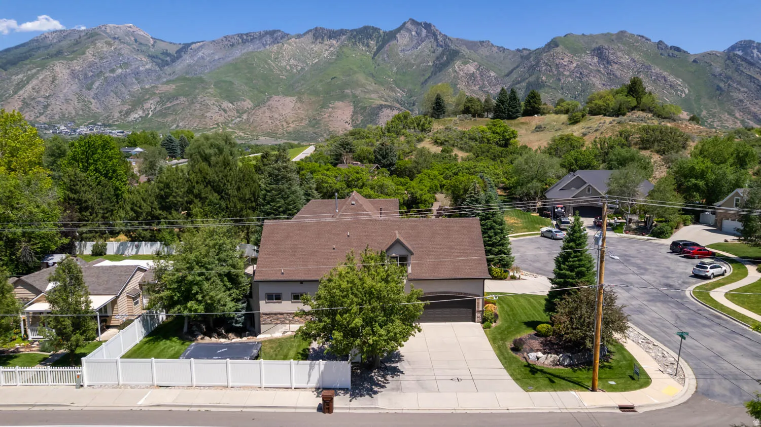 Terraced mountain backdrop framing a residential property on a cul-de-sac