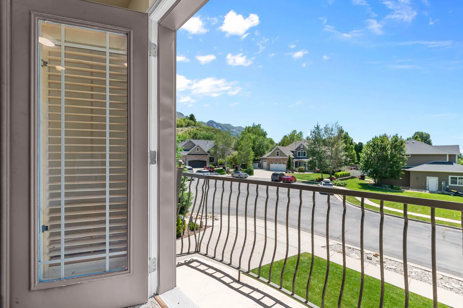 Private balcony with wrought iron railing