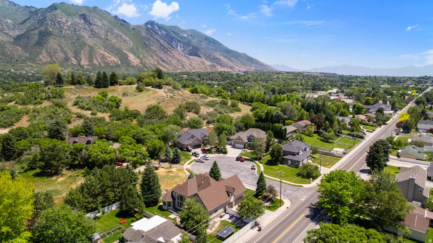 Aerial perspective showcasing a residential neighborhood with varied architectural styles