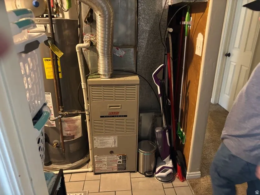 Open Utility Room leads to laundry area