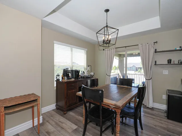 Tray ceiling with a contemporary geometric chandelier