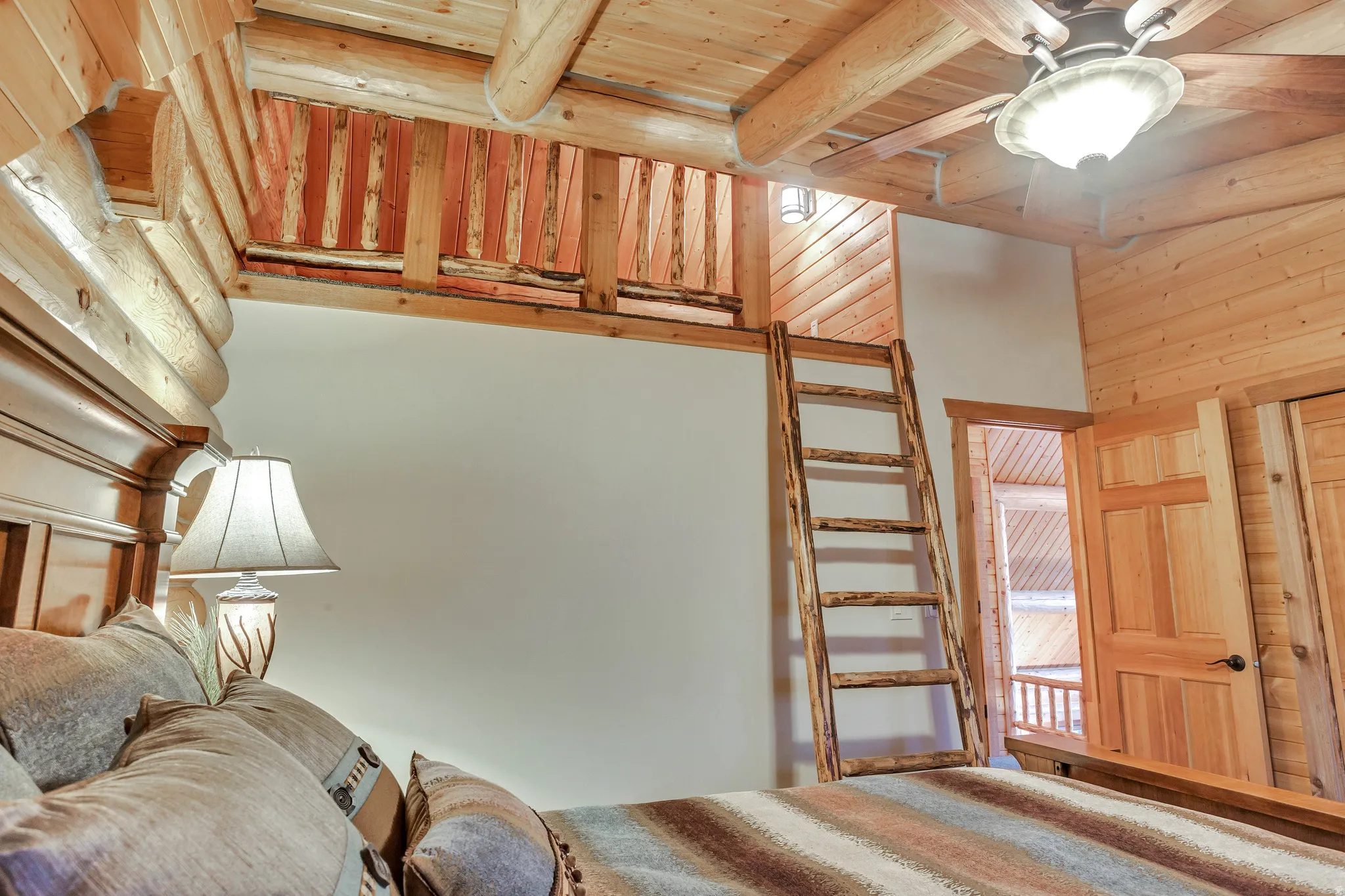 Natural wood log construction and paneling throughout