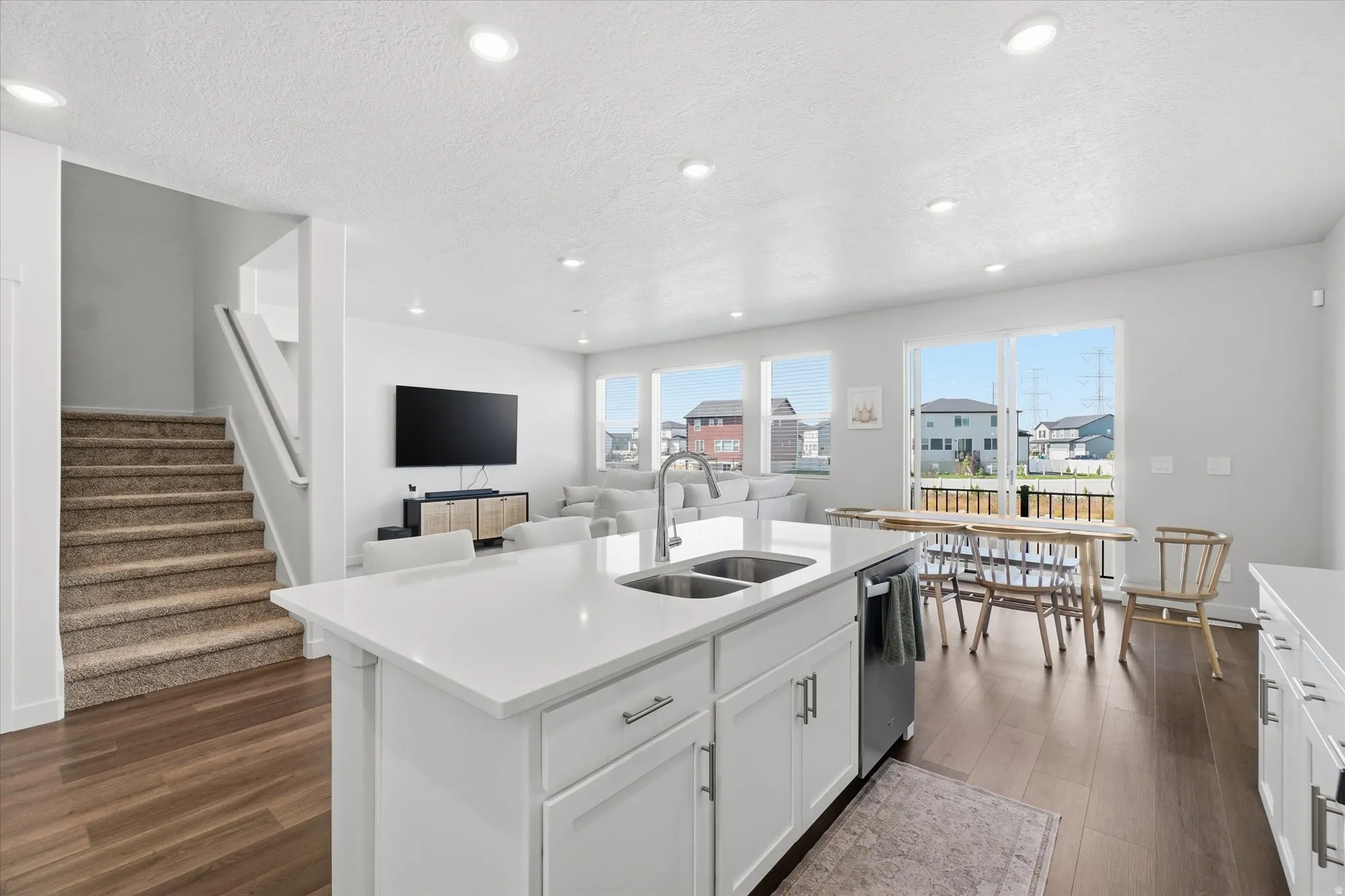 Kitchen island with double basin sink and quartz countertop