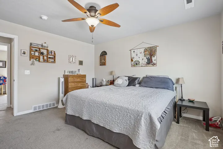 Plush carpet flooring complements neutral wall tones