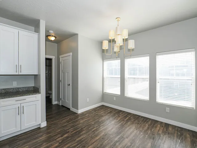 speckled countertop, and a solid interior door