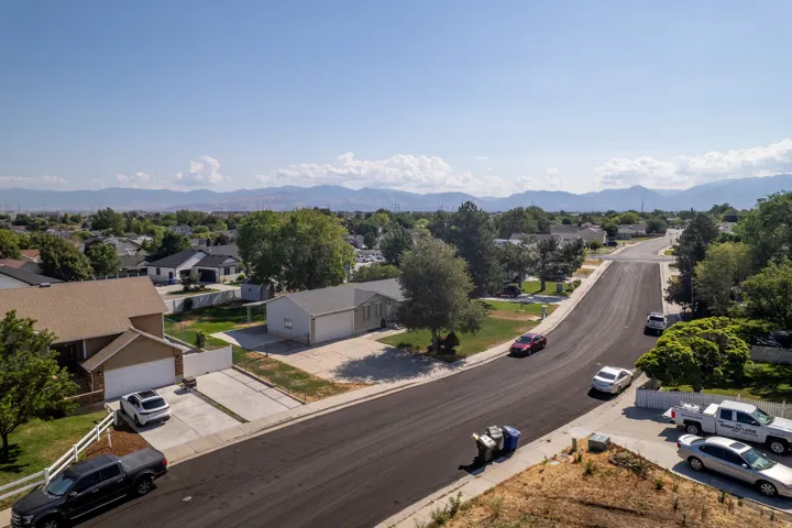 Suburban neighborhood with paved streets and mature trees